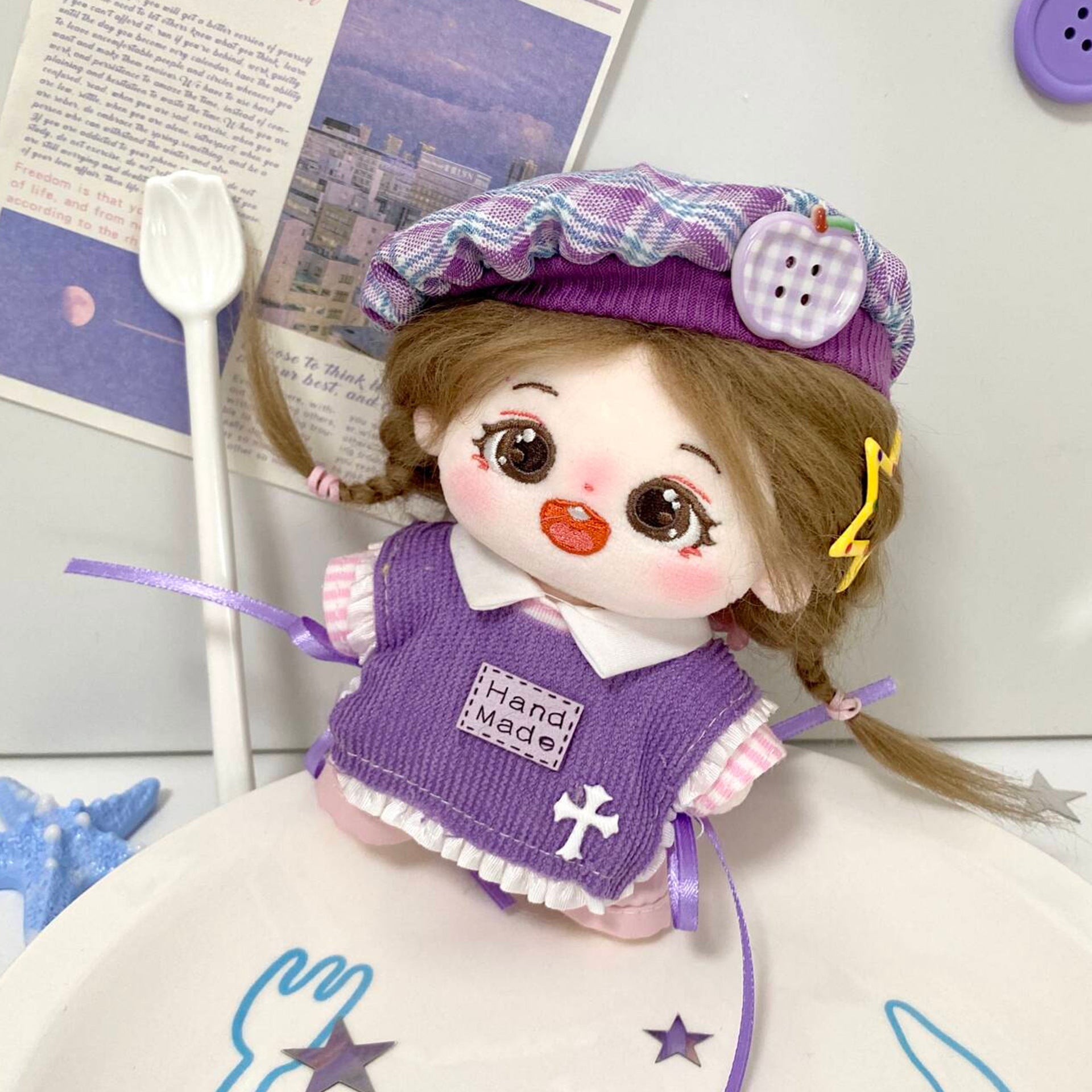 Purple and pink layered outfit shown on a 10cm plush